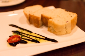 The presentation of the bread is nice, but I prefer to pour my own olive oil and vinegar.