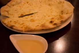 Gorgonzola Pizza with honey on the side.